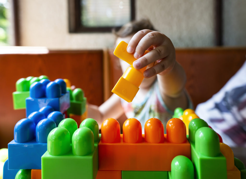 Child playing with cubes