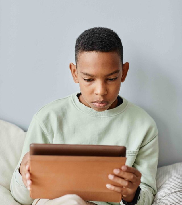 Teenager using Tablet